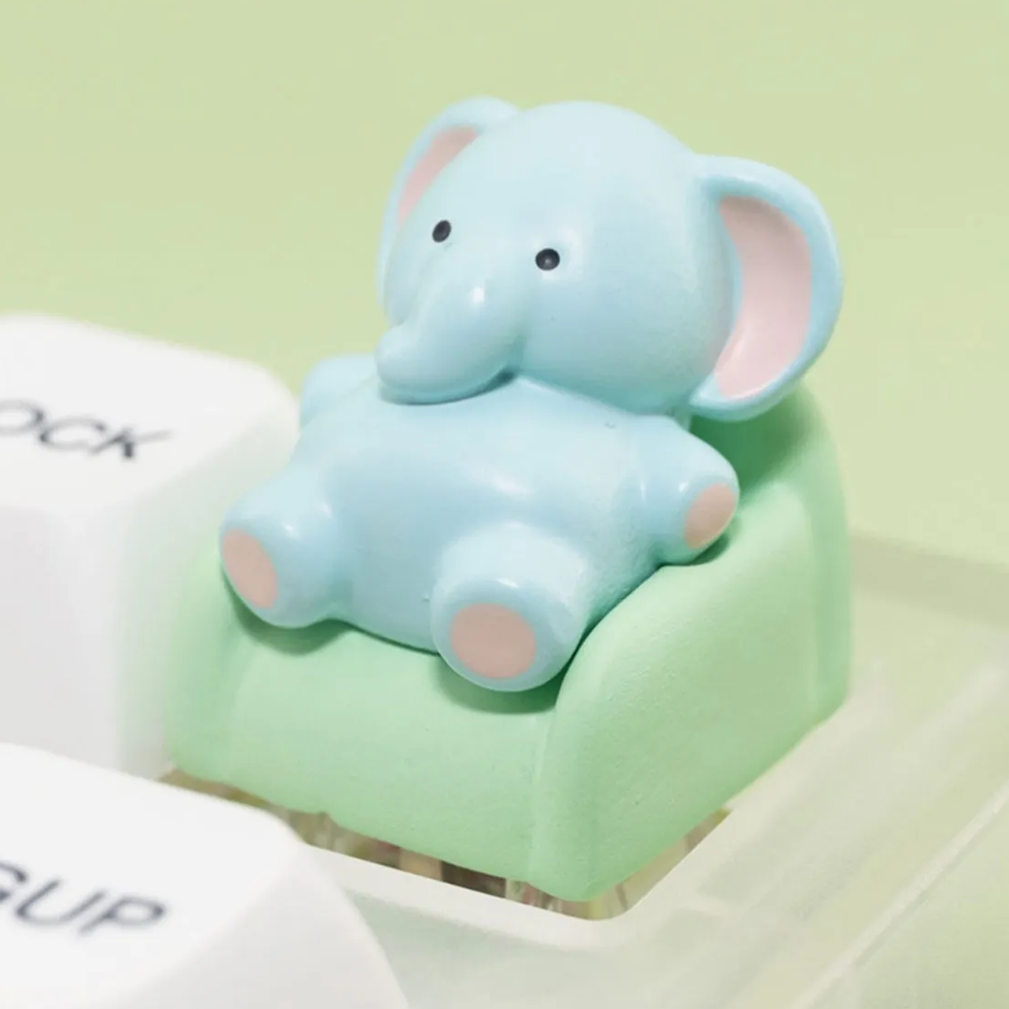 Lazy Elephant Lounging on Sofa Keycap