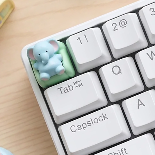 Lazy Elephant Lounging on Sofa Keycap